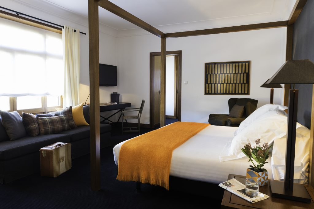 A luxury bedroom suite at Hotel Primero Primera, Barcelona